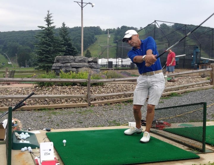 One of the experiment’s golfers, Ben Farrell, at the tee driving his ball as part of an experimental run. 