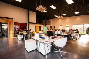 people-sitting-on-chairs-beside-their-desks-in-an-office-1170412